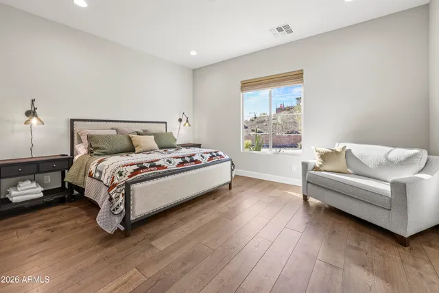 a bed room with a bed and a couch