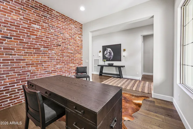 a view of a livingroom with furniture and window
