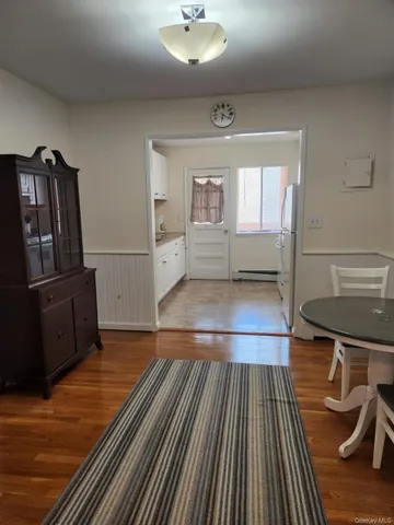 a spacious bathroom with a sink and a mirror