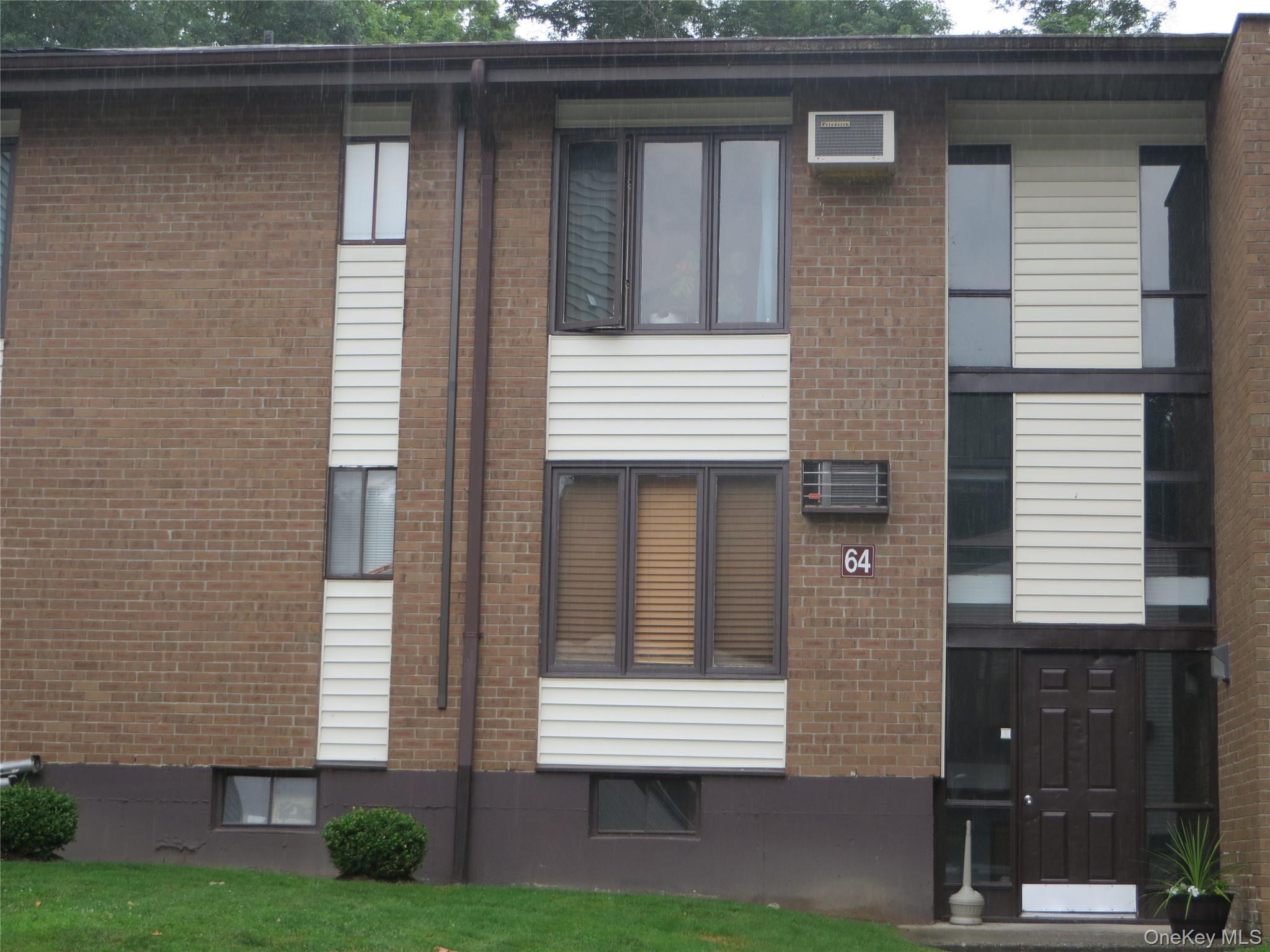 3 Hook Road, Unit 64C Poughkeepsie, NY 12601 - Photo 2 of 15 a front view of a house with garden