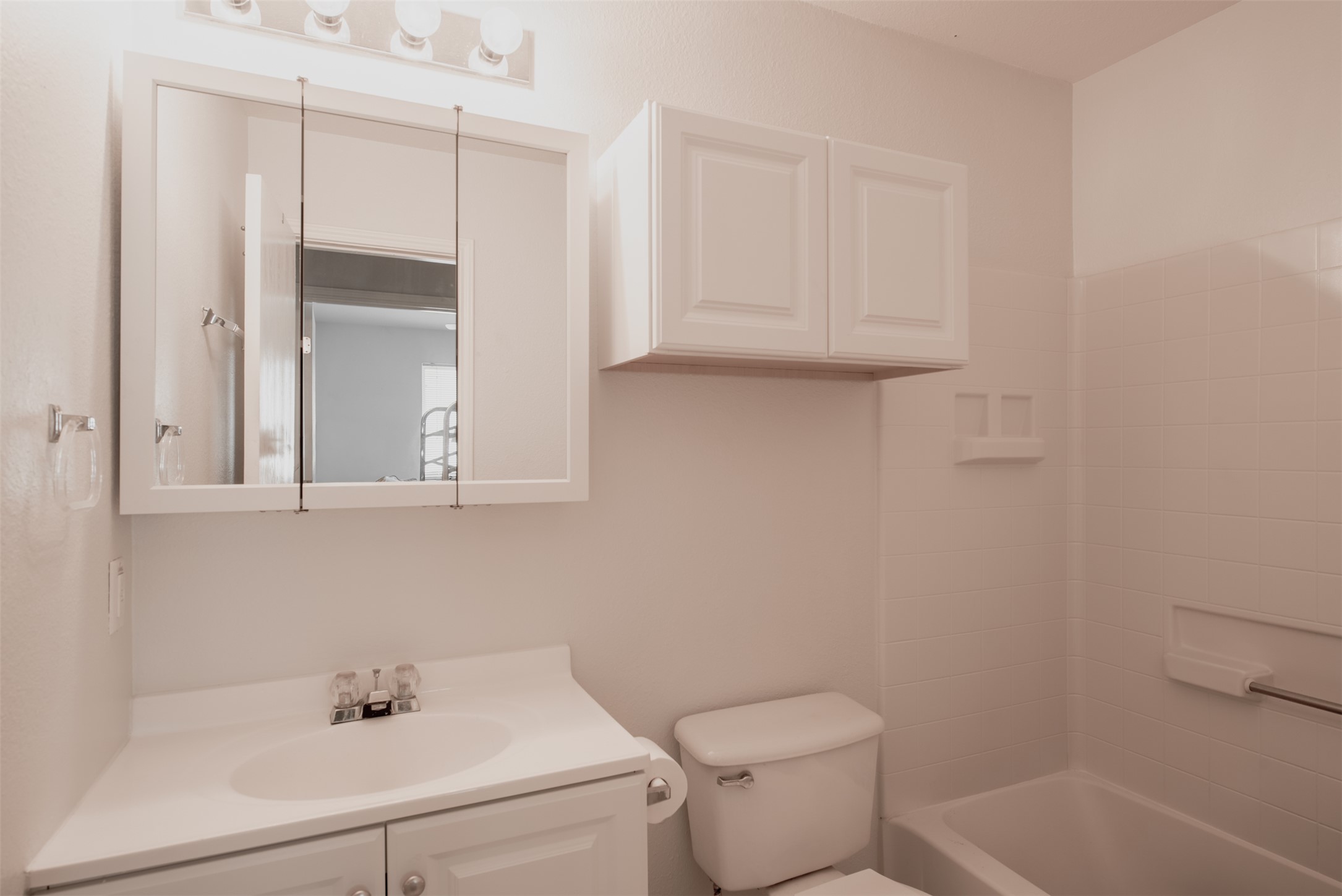 5501 English Avenue Austin, TX 78724 - Photo 13 of 19 a bathroom with a sink a toilet and vanity