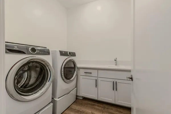 a utility room with dryer and washer