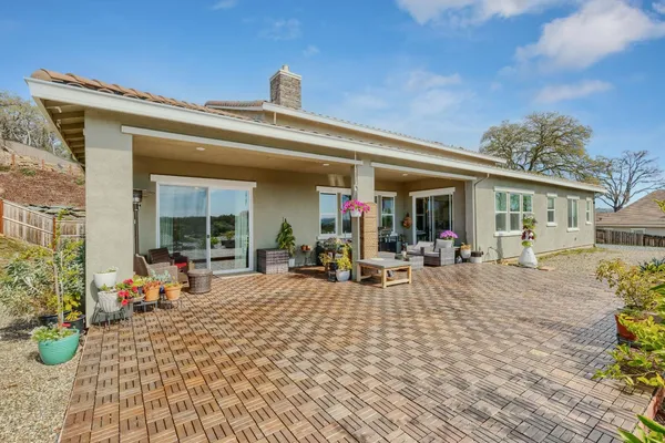 a view of a house with sitting area