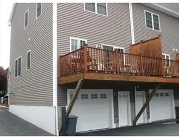 a view of a house with wooden stairs