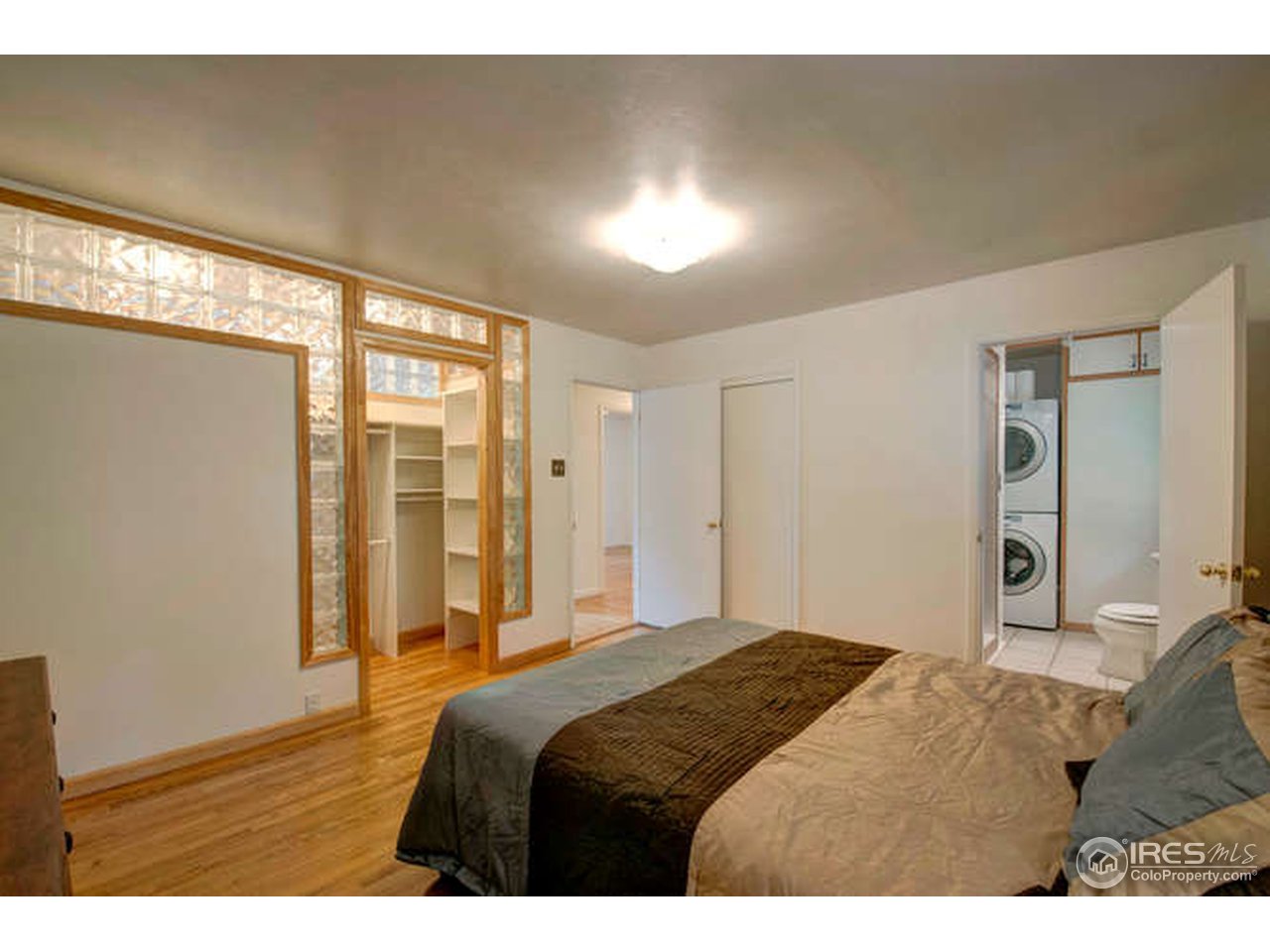 751 Gapter Road Boulder, CO 80303 - Photo 11 of 24 a bedroom with a bed and a large window