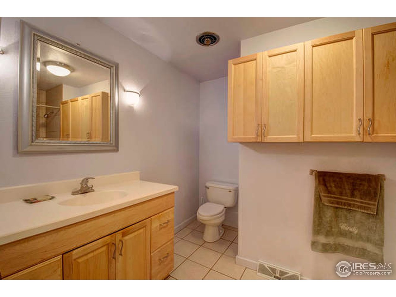 751 Gapter Road Boulder, CO 80303 - Photo 15 of 24 a bathroom with a sink vanity and a mirror