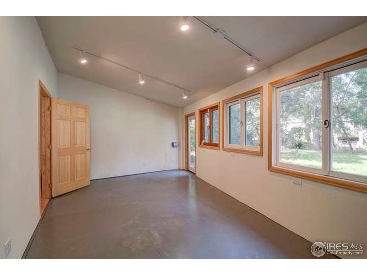 751 Gapter Road Boulder, CO 80303 - Photo 16 of 24 a view of an empty room with a window