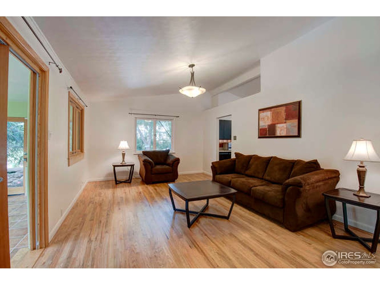 751 Gapter Road Boulder, CO 80303 - Photo 7 of 24 a living room with furniture and a lamp