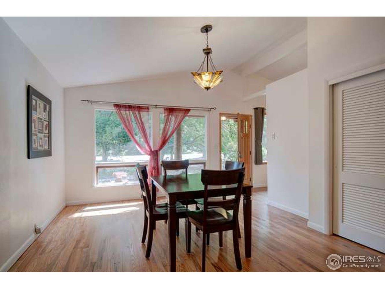 751 Gapter Road Boulder, CO 80303 - Photo 9 of 24 a view of a dining room with furniture and chandelier