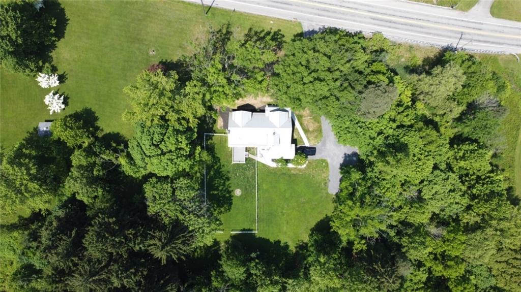 3442 Mercer Road New Castle, PA 16105 - Photo 39 of 39 a green field with lots of trees