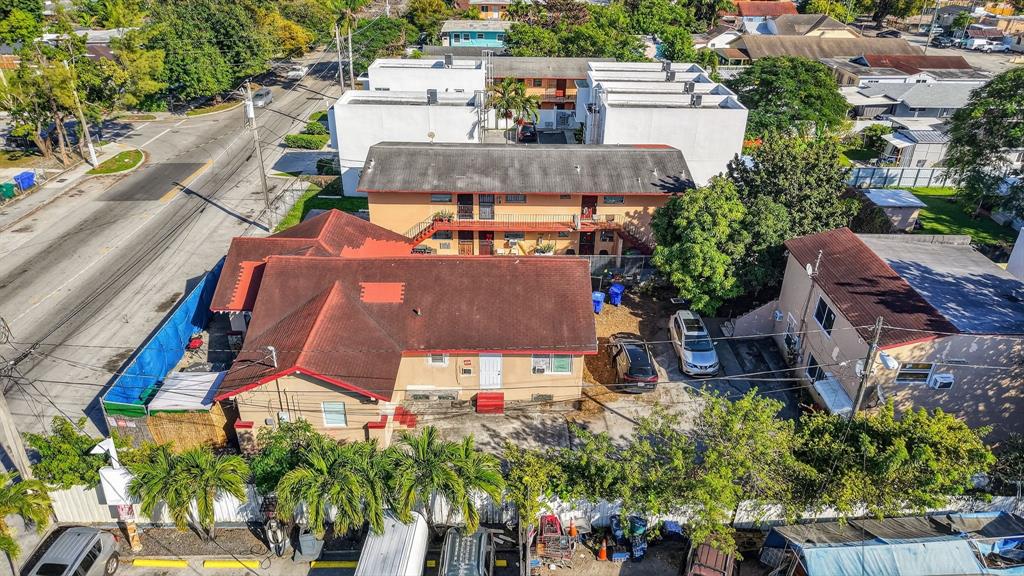 2168 Northwest 28th Street Miami, FL 33142 - Photo 13 of 31 an aerial view of a house with garden space and street view