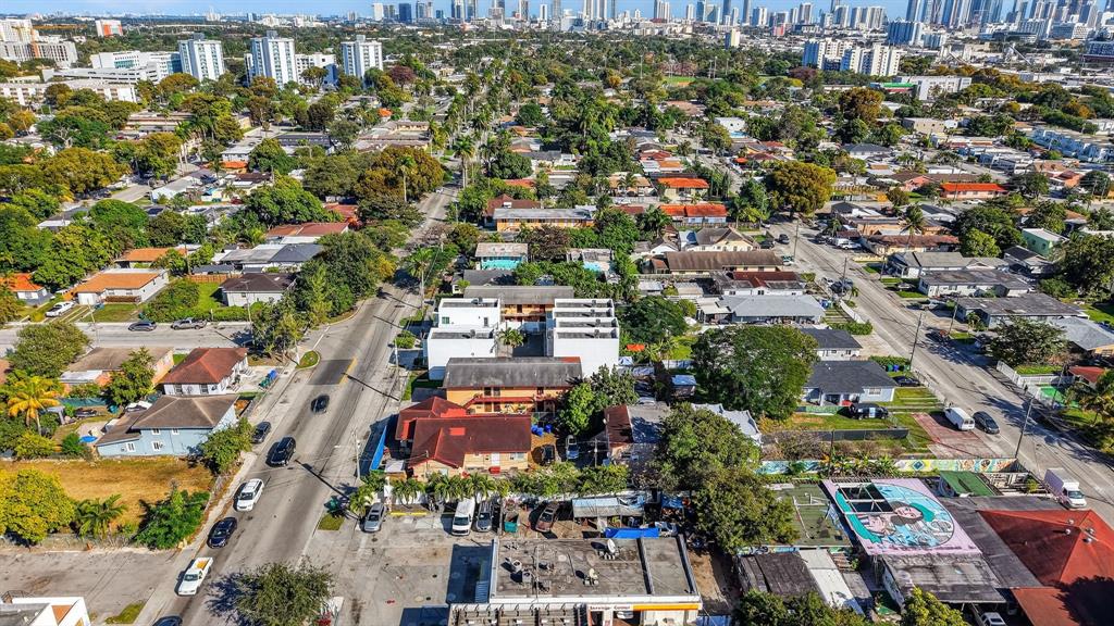 2168 Northwest 28th Street Miami, FL 33142 - Photo 16 of 31 an aerial view of a city