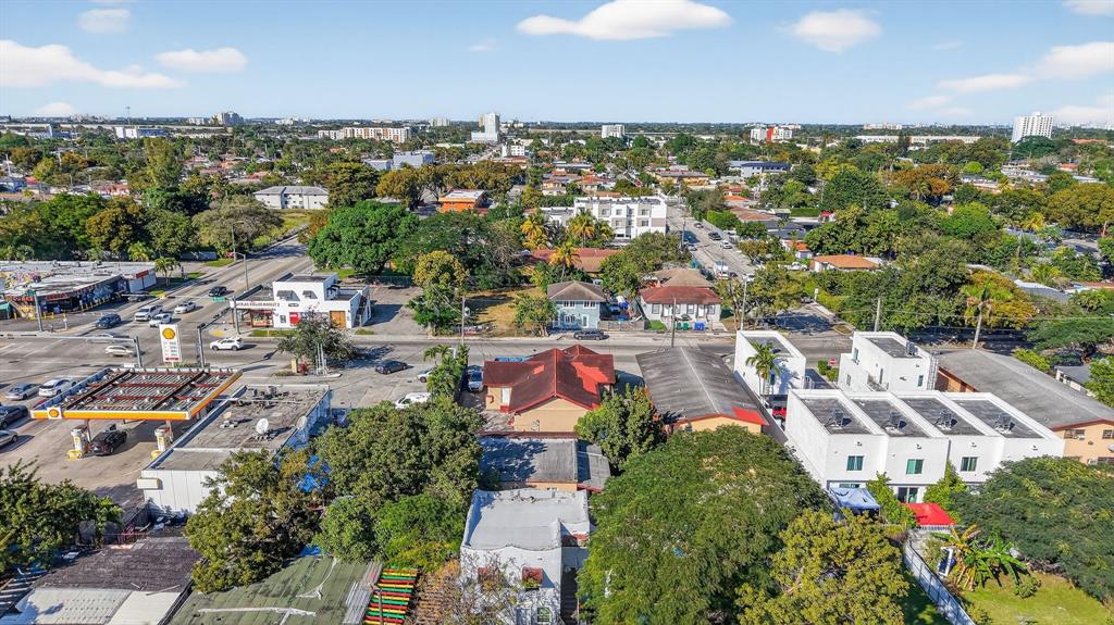 2168 Northwest 28th Street Miami, FL 33142 - Photo 29 of 31 an aerial view of residential houses with outdoor space