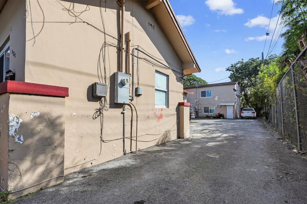 2168 Northwest 28th Street Miami, FL 33142 - Photo 6 of 31 a view of a house with a street