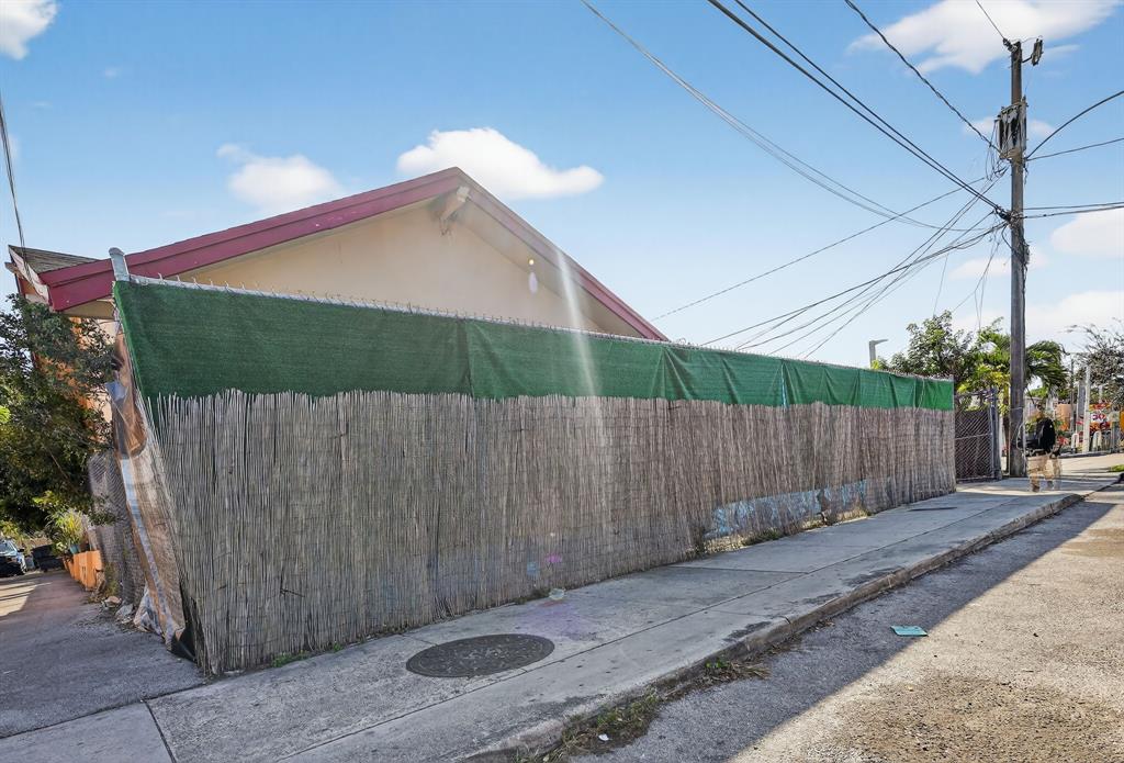 2168 Northwest 28th Street Miami, FL 33142 - Photo 8 of 31 a backyard of a house