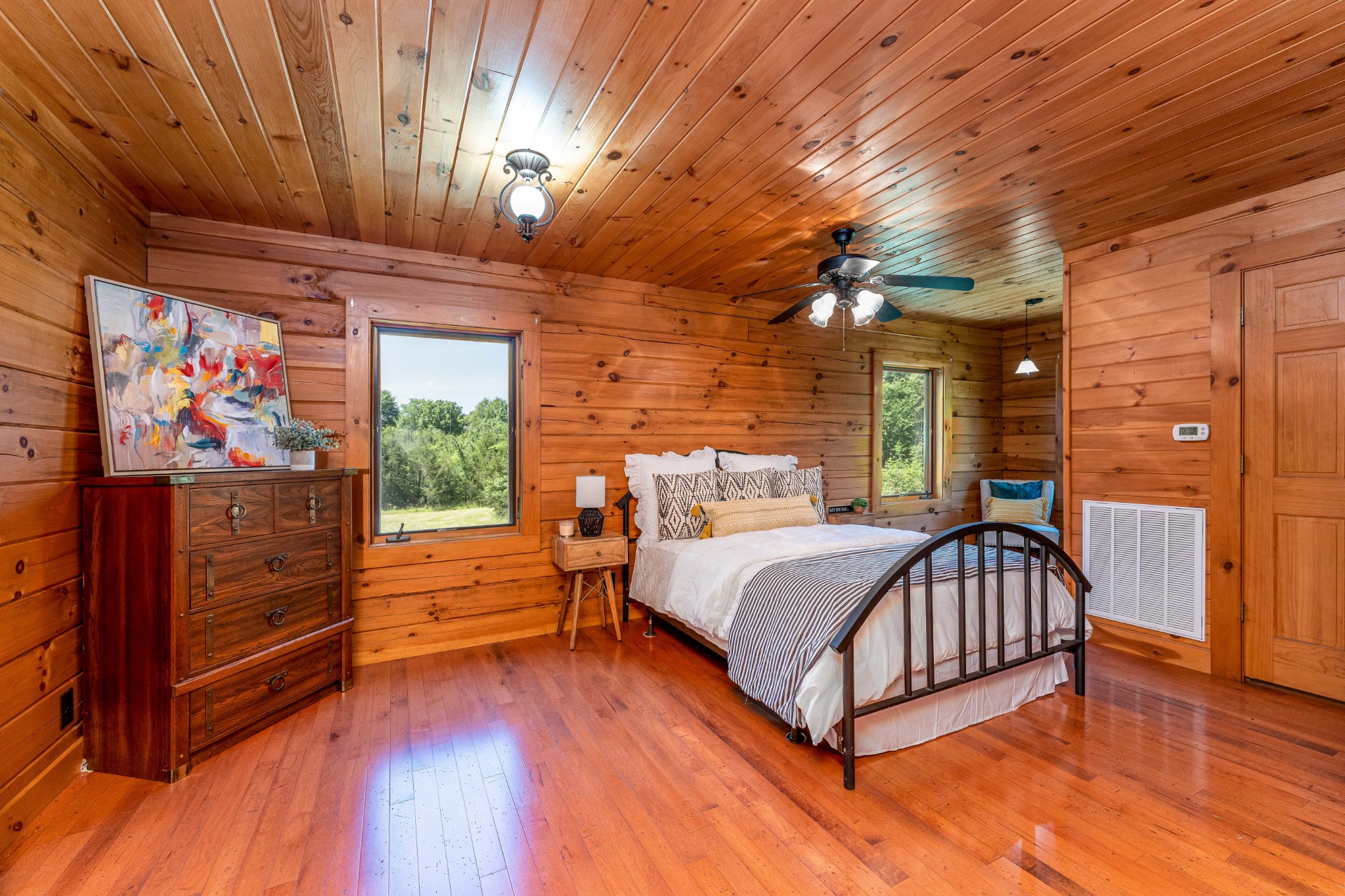 5700 Almaville Road Smyrna, TN 37167 - Photo 13 of 26 a bedroom with a bed and a flat tv screen