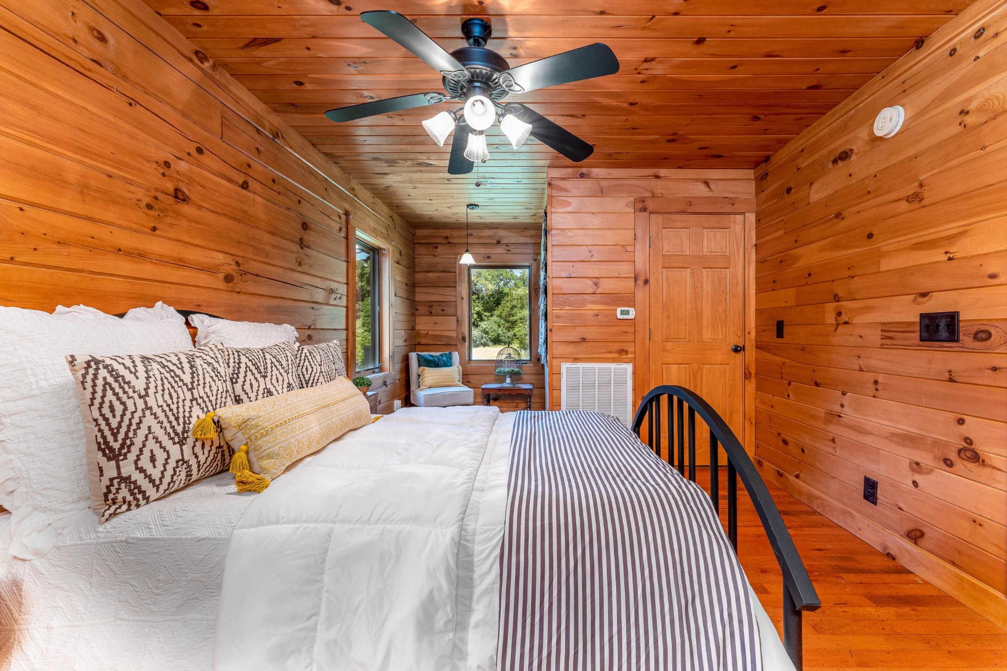 5700 Almaville Road Smyrna, TN 37167 - Photo 15 of 26 a bedroom with a bed and a chandelier