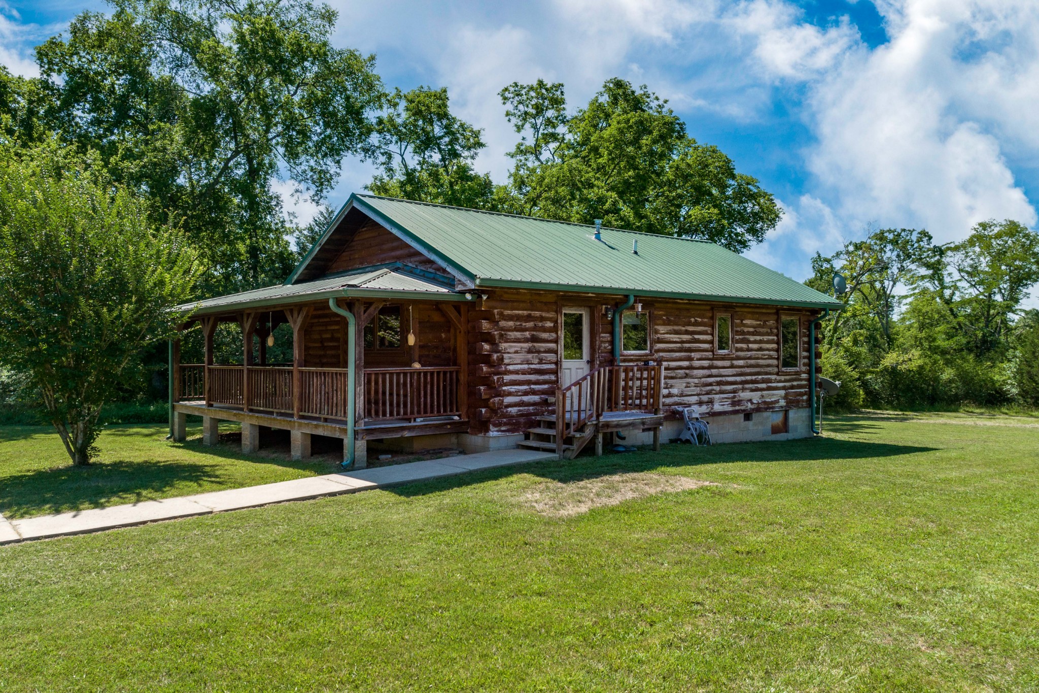5700 Almaville Road Smyrna, TN 37167 - Photo 5 of 26 a view of a house with a yard and deck