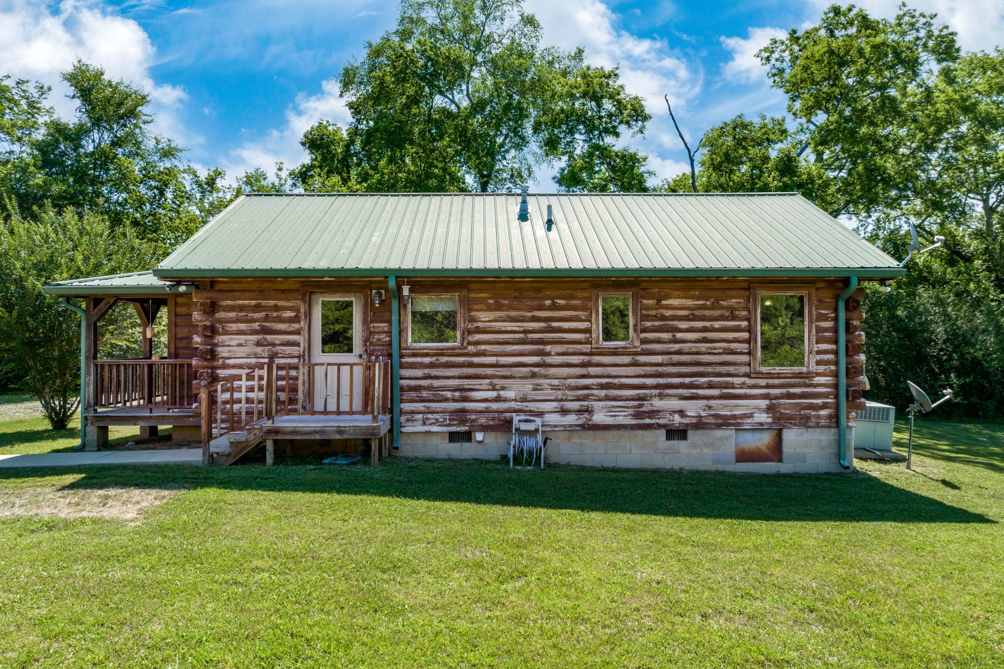 5700 Almaville Road Smyrna, TN 37167 - Photo 6 of 26 a front view of a house with a garden