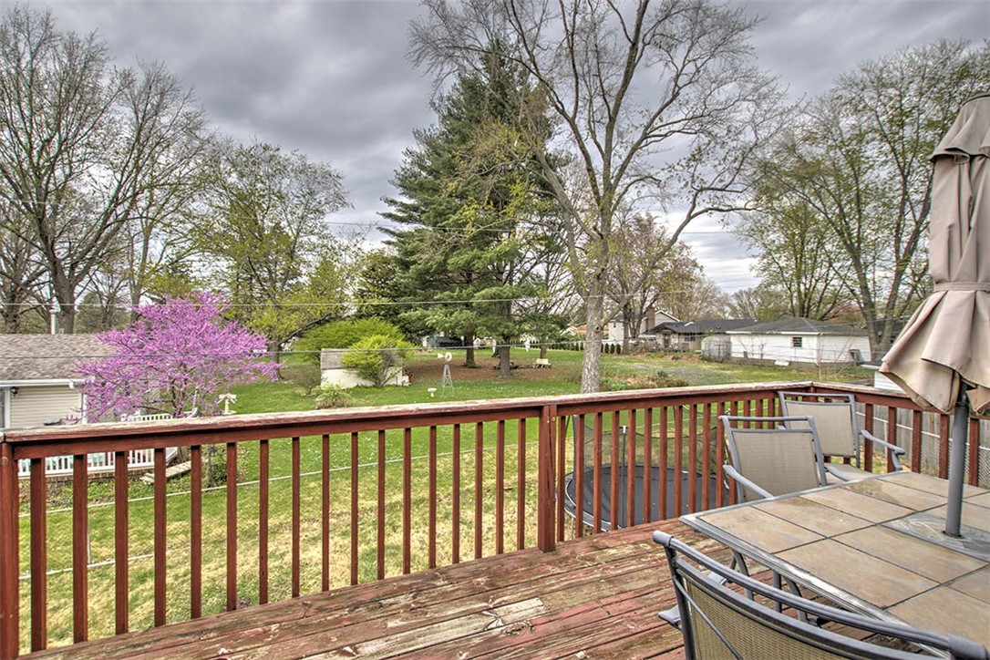 4081 Sheffield Court Decatur, IL 62526 - Photo 26 of 29 a balcony with wooden floor and wooden fence