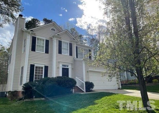 a view of a front of house with a yard