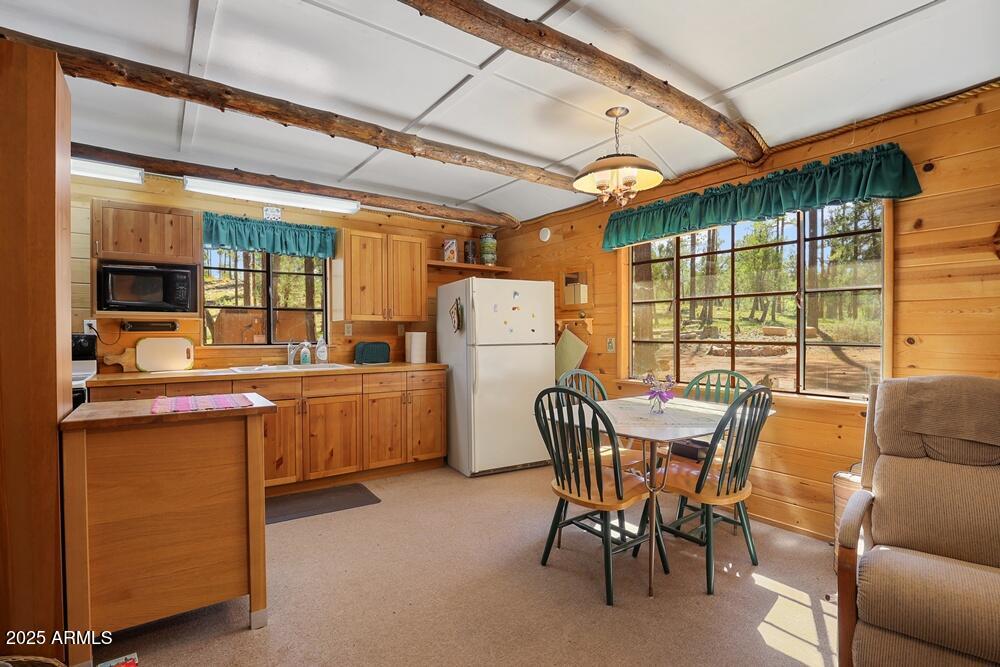 287 South Lookout Trail Payson, AZ 85541 - Photo 16 of 32 a dining room with furniture and a window