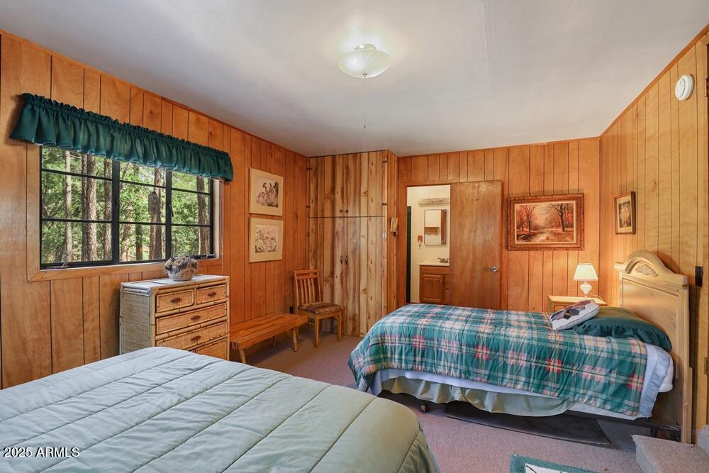 287 South Lookout Trail Payson, AZ 85541 - Photo 19 of 32 a bedroom with a bed and wooden floor
