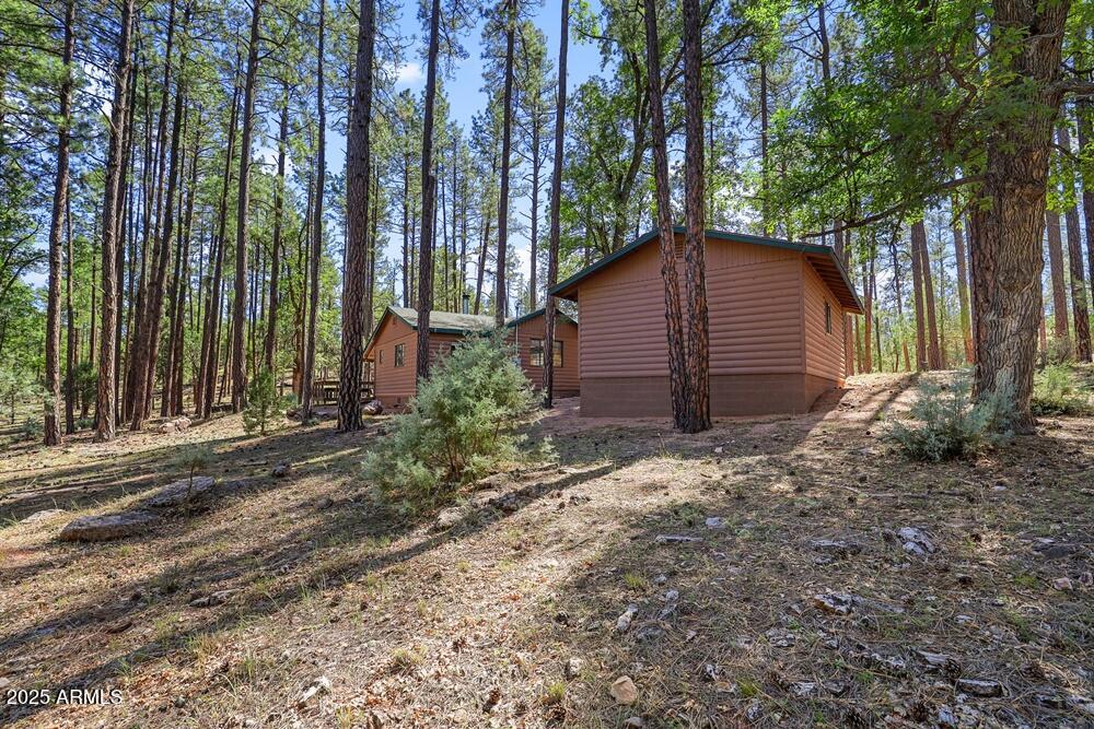 287 South Lookout Trail Payson, AZ 85541 - Photo 23 of 32 a view of a house with backyard and trees
