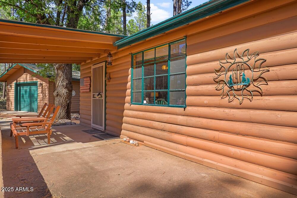 287 South Lookout Trail Payson, AZ 85541 - Photo 7 of 32 a balcony with furniture and a potted plant