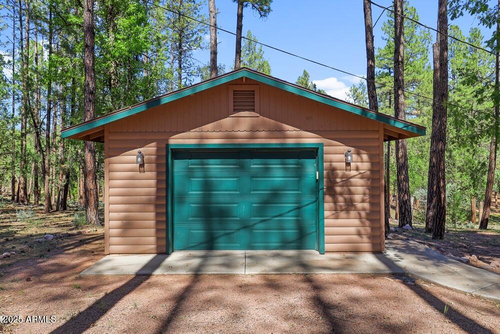 287 South Lookout Trail Payson, AZ 85541 - Photo 8 of 32 a front view of a house with a yard