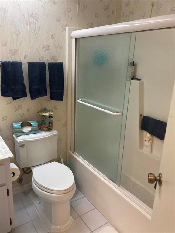 8744 Southwest 108th Ln Road Ocala, FL 34481 - Photo 12 of 28 a bathroom with a toilet and a shower