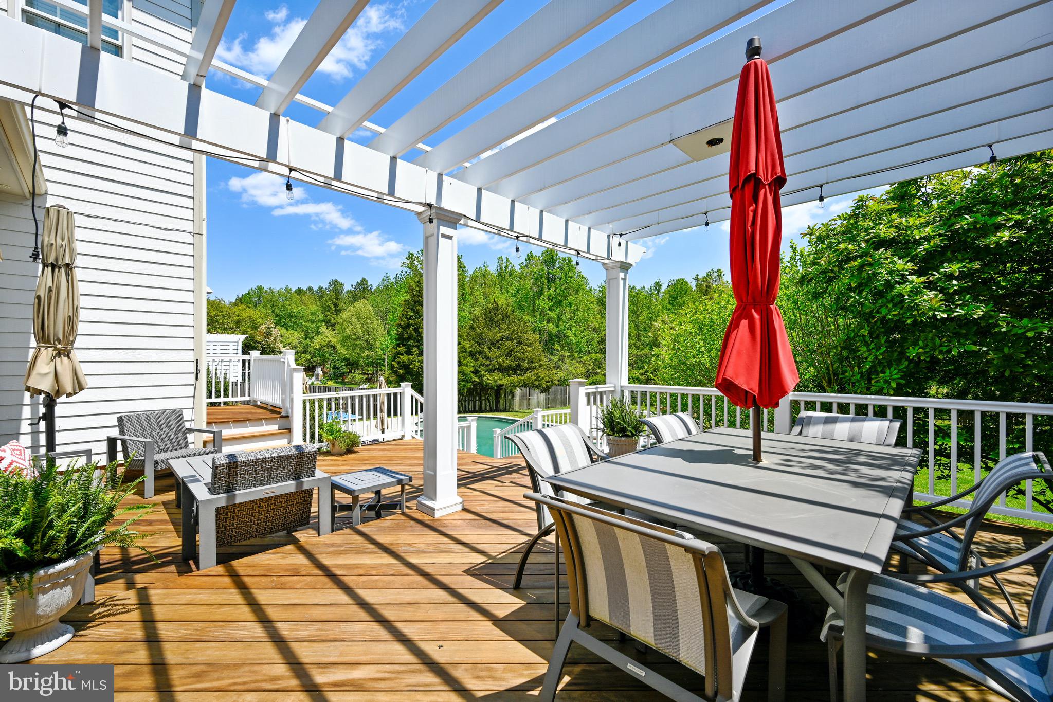 3417 Hidden River View Road Annapolis, MD 21403 - Photo 2 of 27 Ipe deck with pergola for outdoor dining