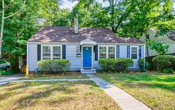a house view with a garden space