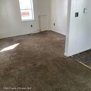 42 Fallbrook Street Carbondale, PA 18407 - Photo 31 of 41 an empty room with an entryway