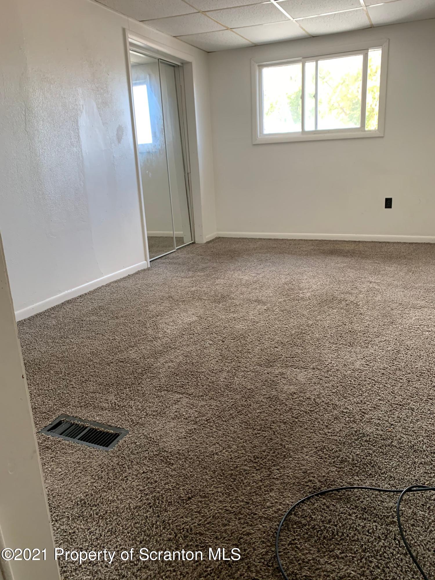 42 Fallbrook Street Carbondale, PA 18407 - Photo 32 of 41 an empty room with windows