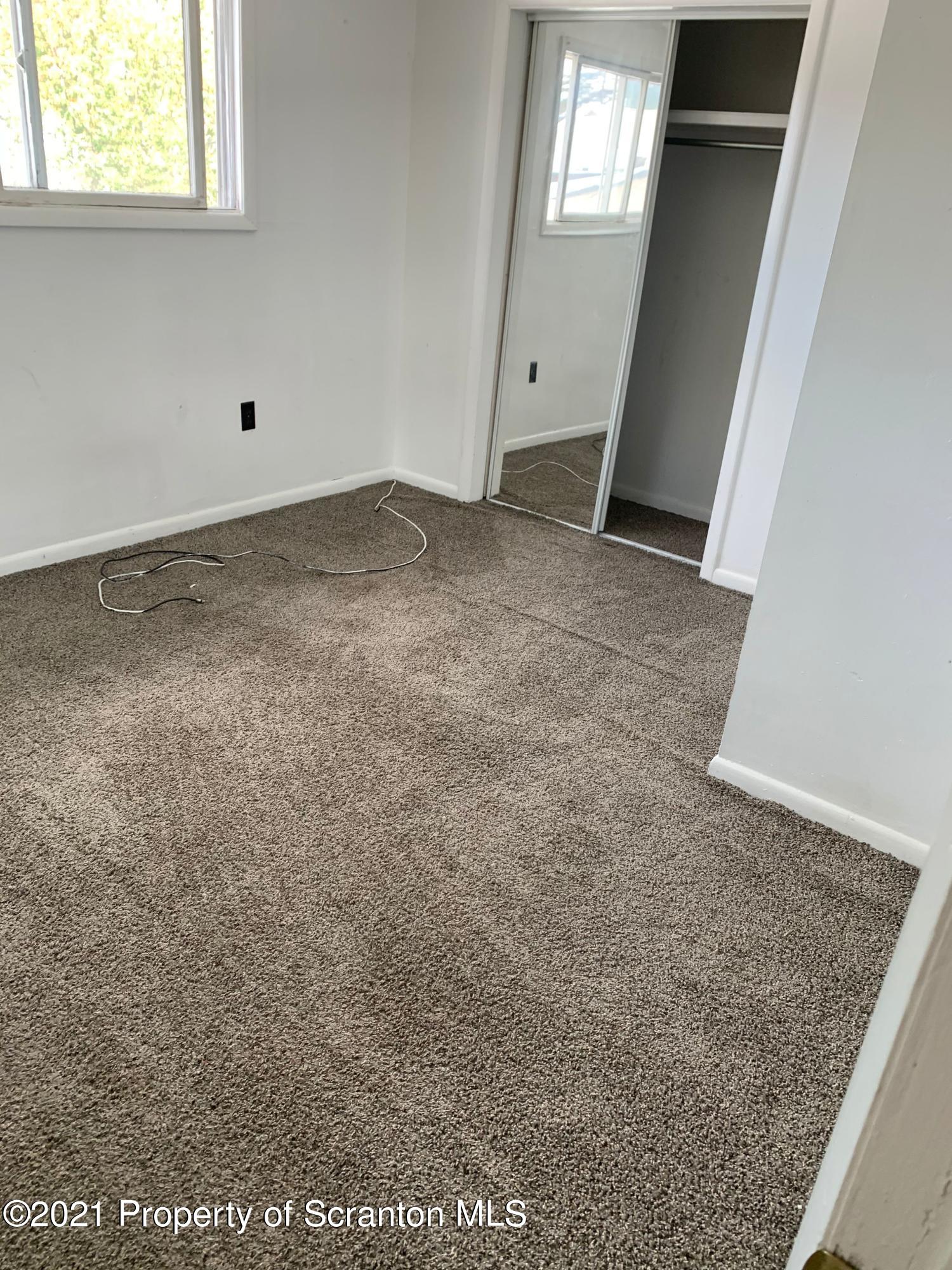 42 Fallbrook Street Carbondale, PA 18407 - Photo 33 of 41 an empty room with windows