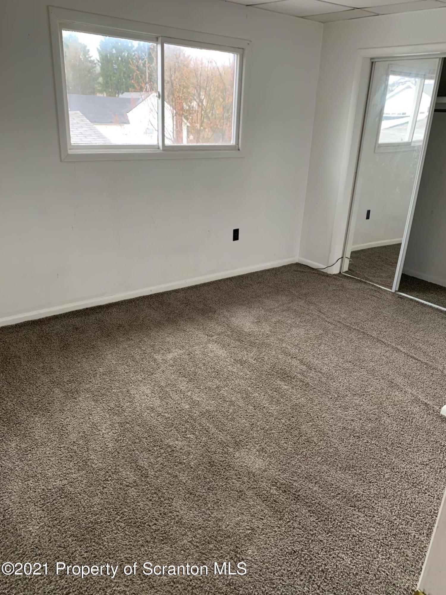 42 Fallbrook Street Carbondale, PA 18407 - Photo 35 of 41 an empty room with a window