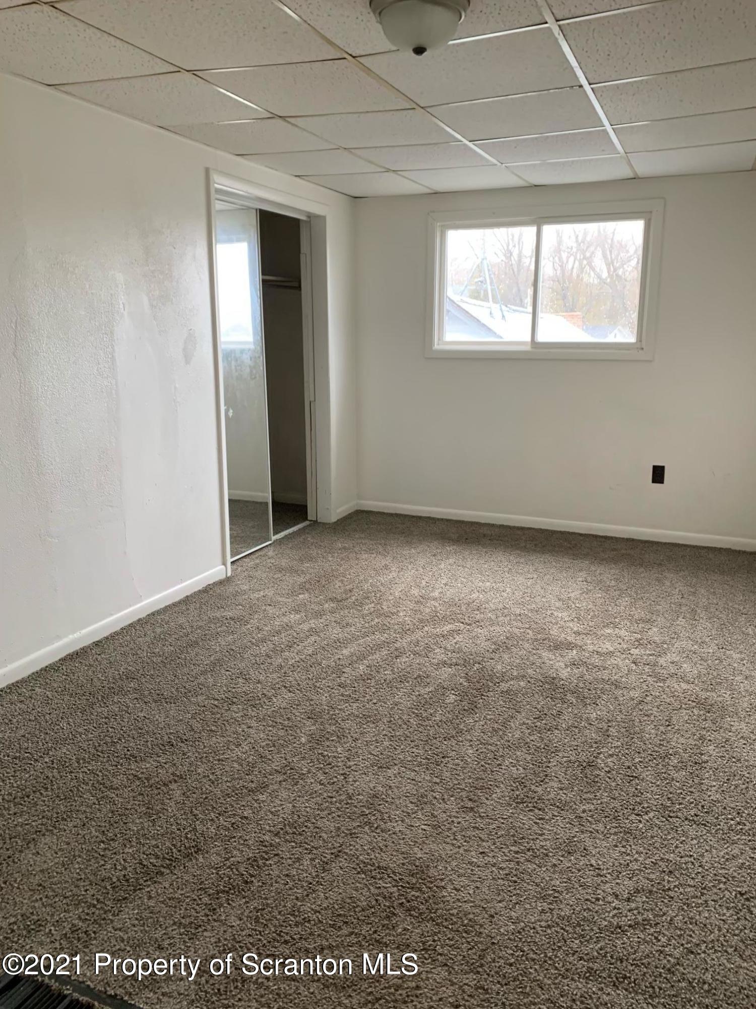 42 Fallbrook Street Carbondale, PA 18407 - Photo 36 of 41 an empty room with windows