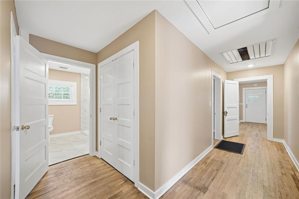 3418 Refuge Road Jasper, GA 30143 - Photo 20 of 55 a view of a hallway with wooden floor and closet area