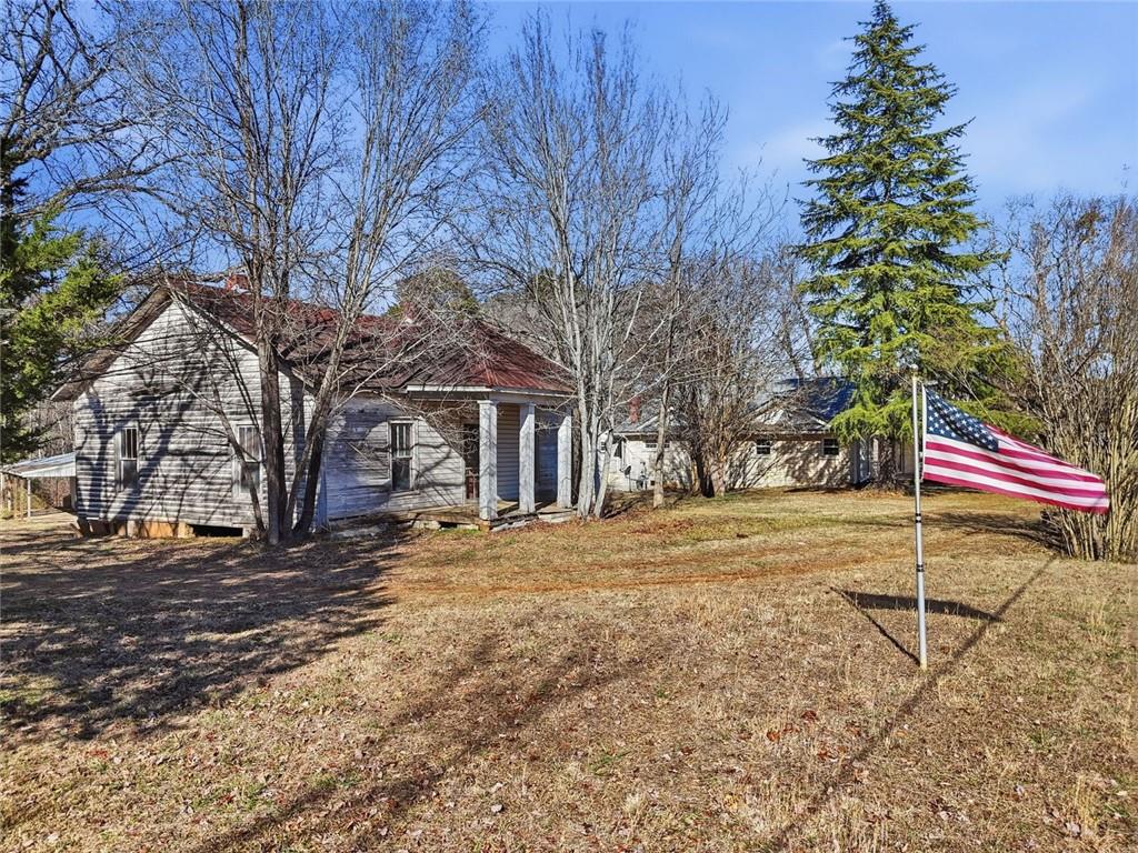 3418 Refuge Road Jasper, GA 30143 - Photo 2 of 55 a garden view with a trees