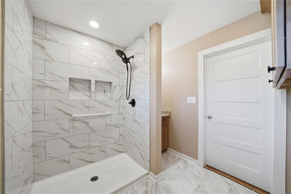 3418 Refuge Road Jasper, GA 30143 - Photo 24 of 55 a bathroom with a shower and a sink
