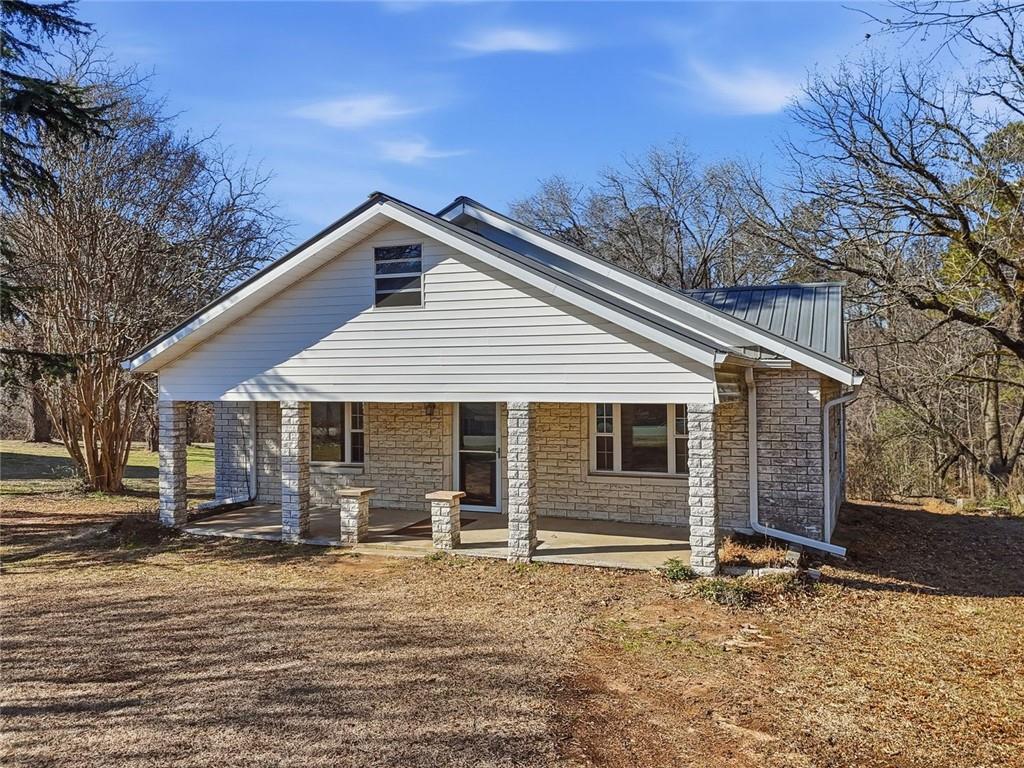 3418 Refuge Road Jasper, GA 30143 - Photo 36 of 55 a front view of house with yard
