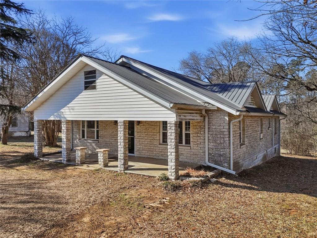 3418 Refuge Road Jasper, GA 30143 - Photo 37 of 55 a view of a house with a yard and wooden fence