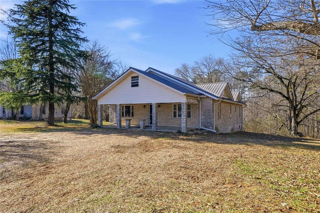 3418 Refuge Road Jasper, GA 30143 - Photo 44 of 55 a front view of a house with a yard