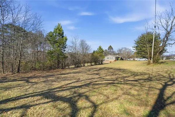a view of a house with a big yard