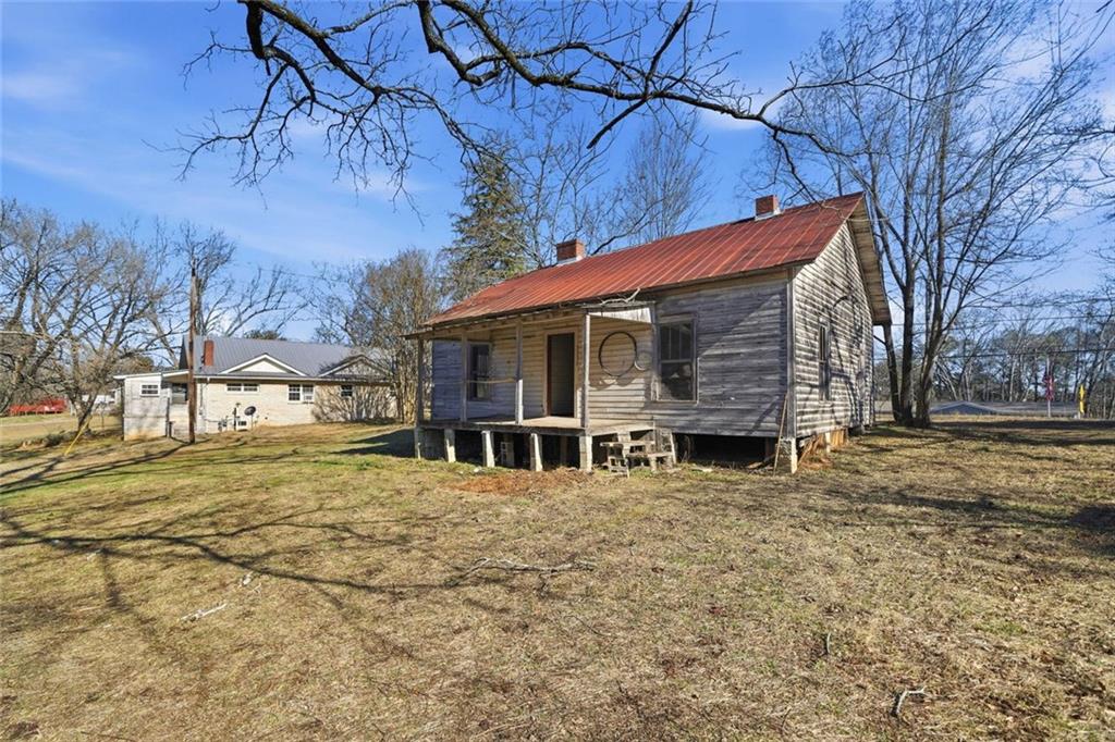 3418 Refuge Road Jasper, GA 30143 - Photo 49 of 55 a view of a house with a yard