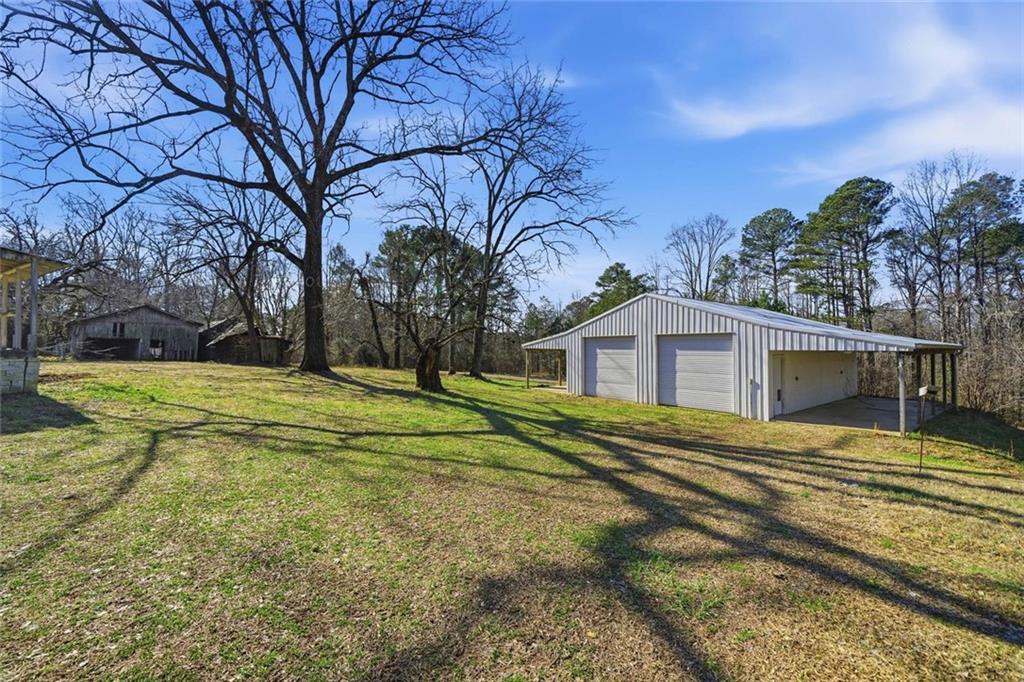 3418 Refuge Road Jasper, GA 30143 - Photo 50 of 55 a view of a house with a big yard