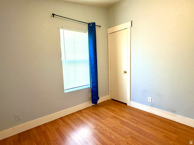 1025 North 300 West, Unit 1 Springville, UT 84663 - Photo 17 of 35 Empty room with light wood-style flooring and baseboards