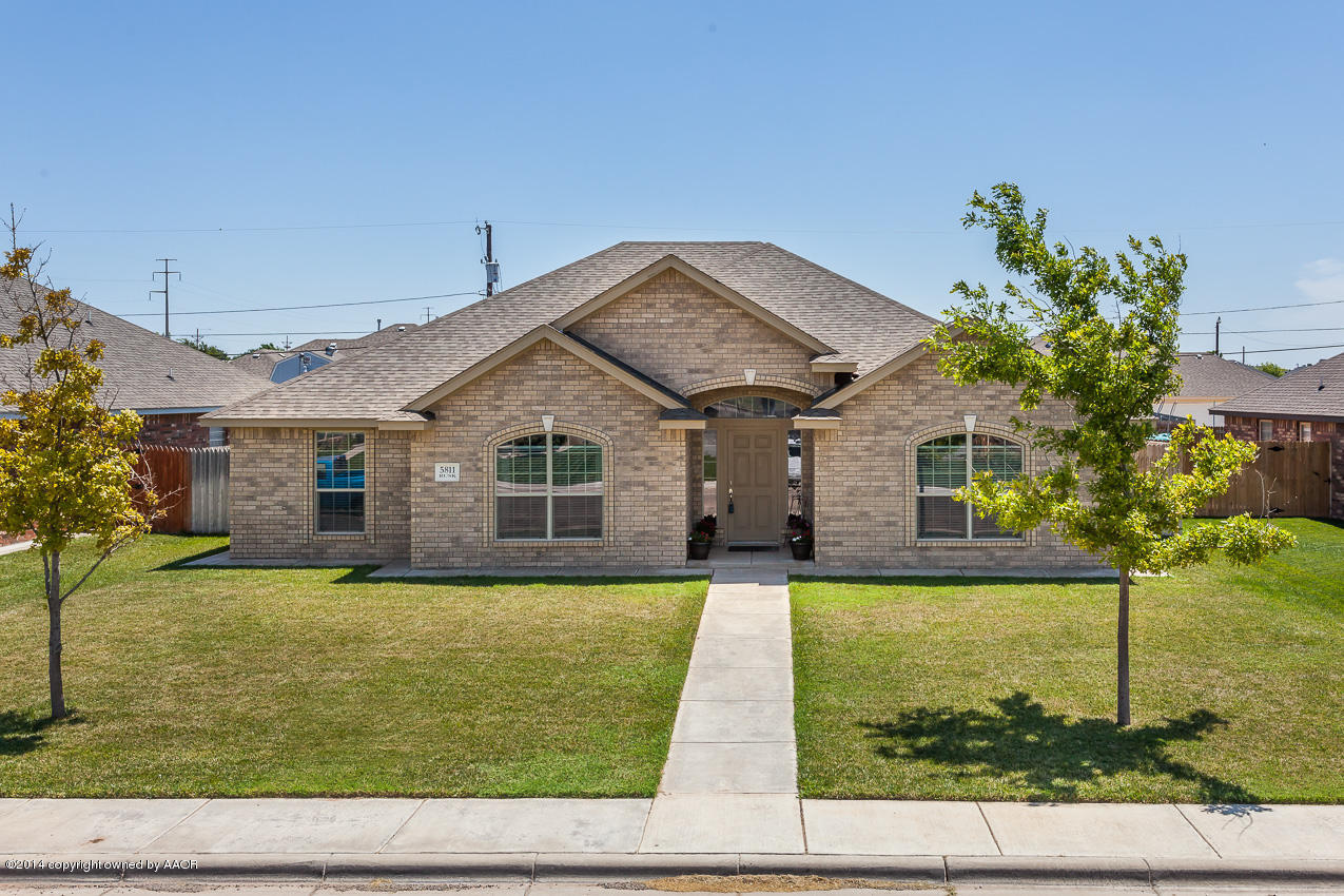 a front view of house with yard