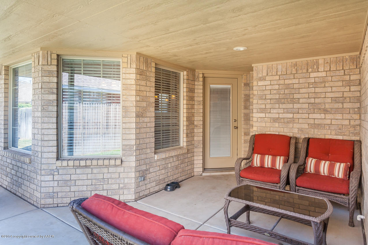 5811 South Rusk Street Amarillo, TX 79118 - Photo 19 of 22 a living room with furniture and a window